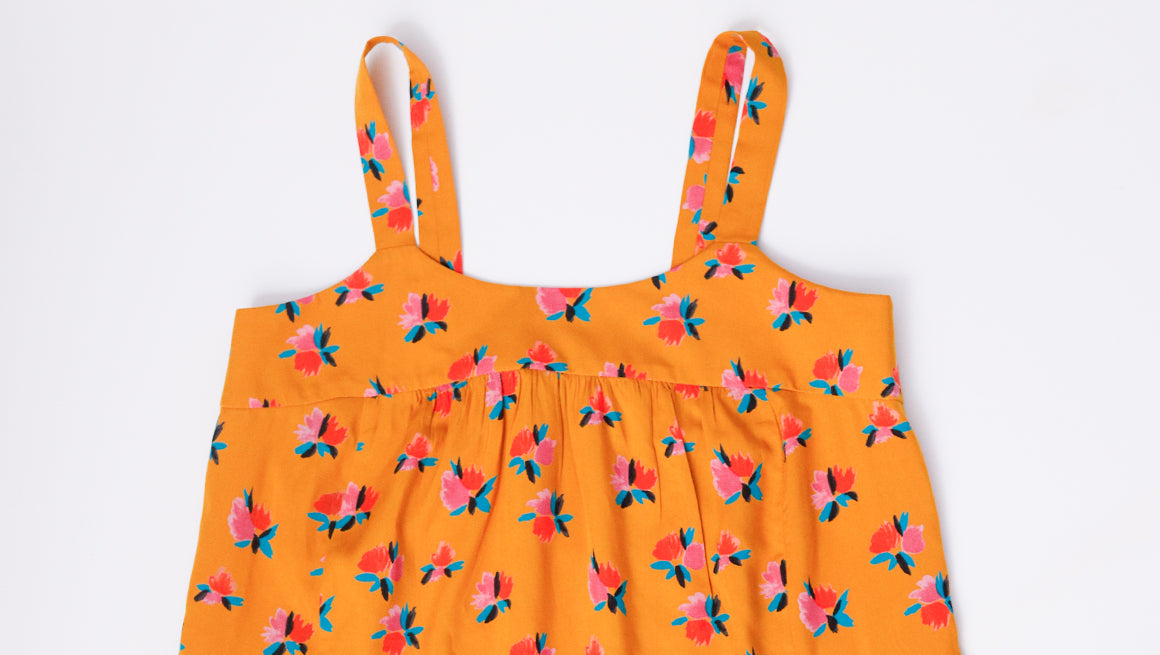 Sew the bodice to the dress feature