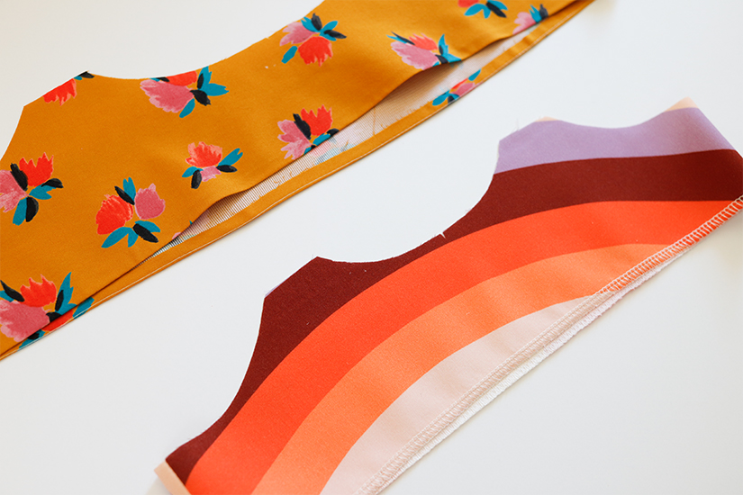 One Marcel bodice is shown with 1/4" folded and pressed to inside while another is shown with the bottom edge serged.