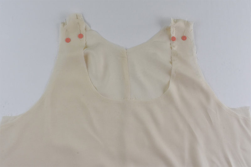 Cream Lining pieces are shown pinned at the shoulders.