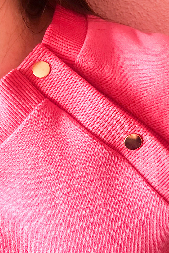 A close up of the page button shoulder sewing pattern hack