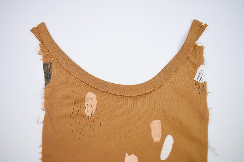 The armhole bias of the Farrah sewing pattern is shown folded.