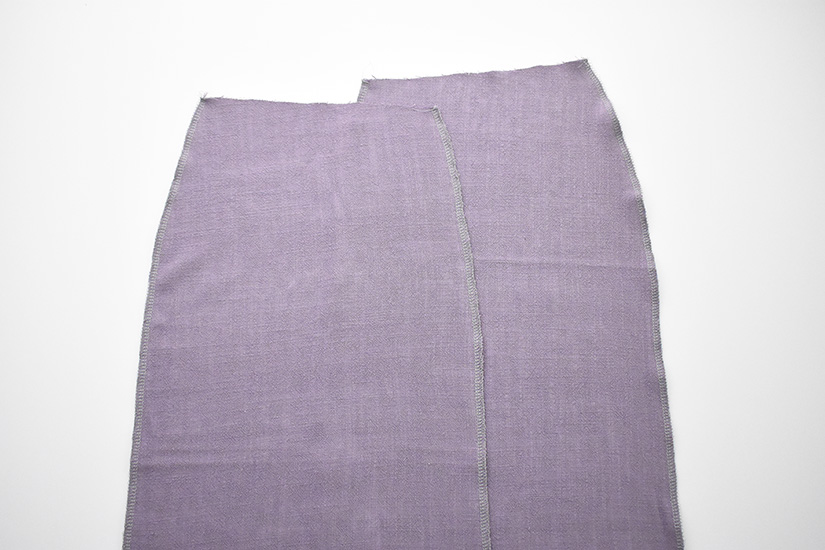 The center back seams of the Evelyn skirt are shown with one edge finished. 