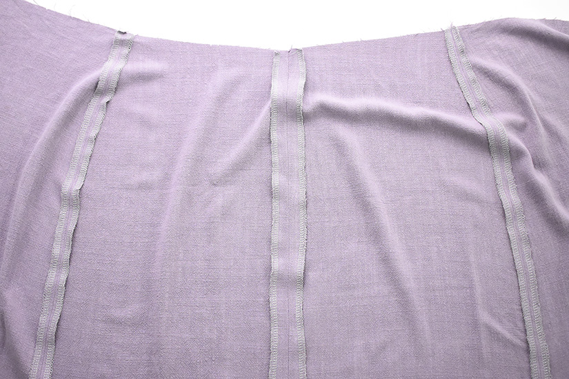 The center back seam of the Evelyn Skirt pattern is shown pressed open. 