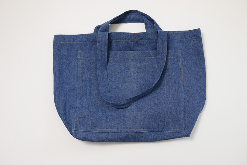 A sewn Sun Tote is shown on a white background. 