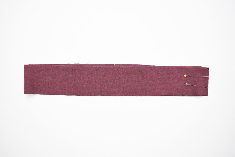 One Pony Tank armhole band is shown pinned at the short edge. 