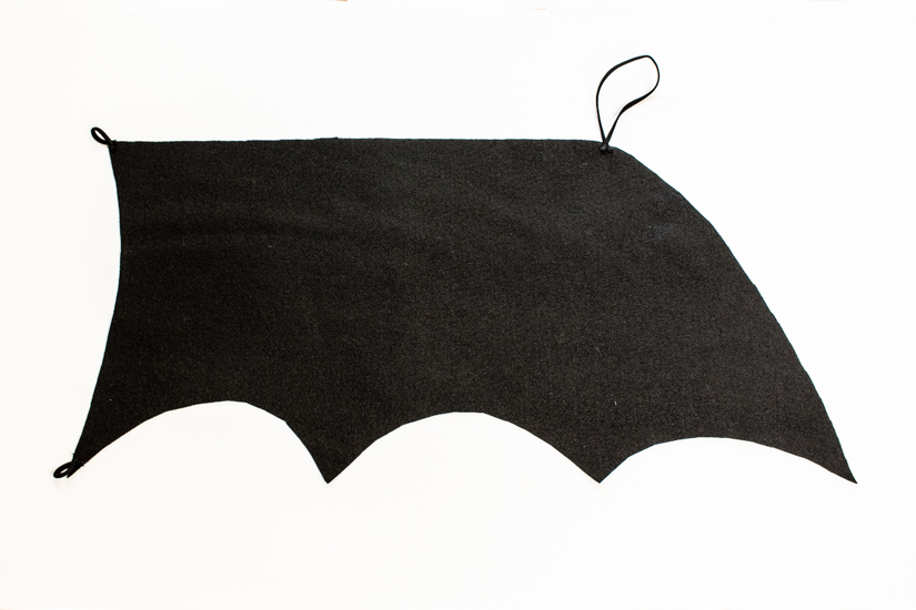 A DIY Bat halloween costume wing is shown on a white background.
