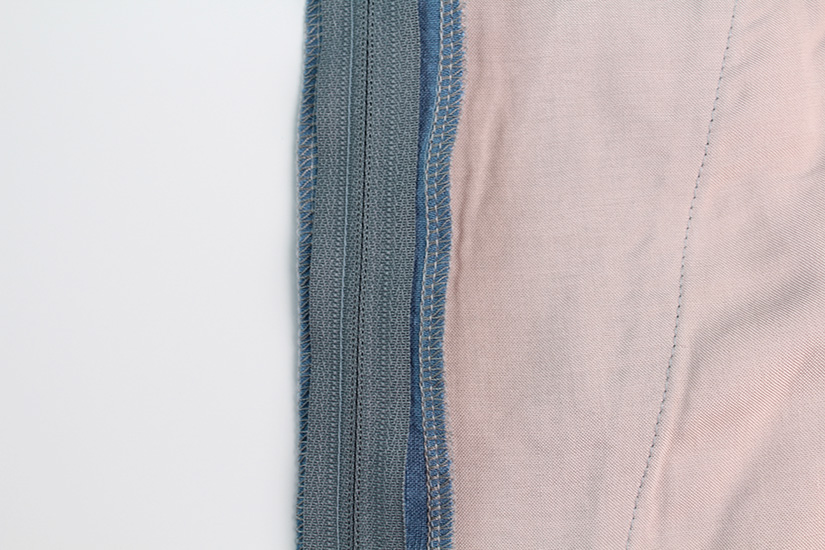 The zipper is sewn to the Crew Shorts