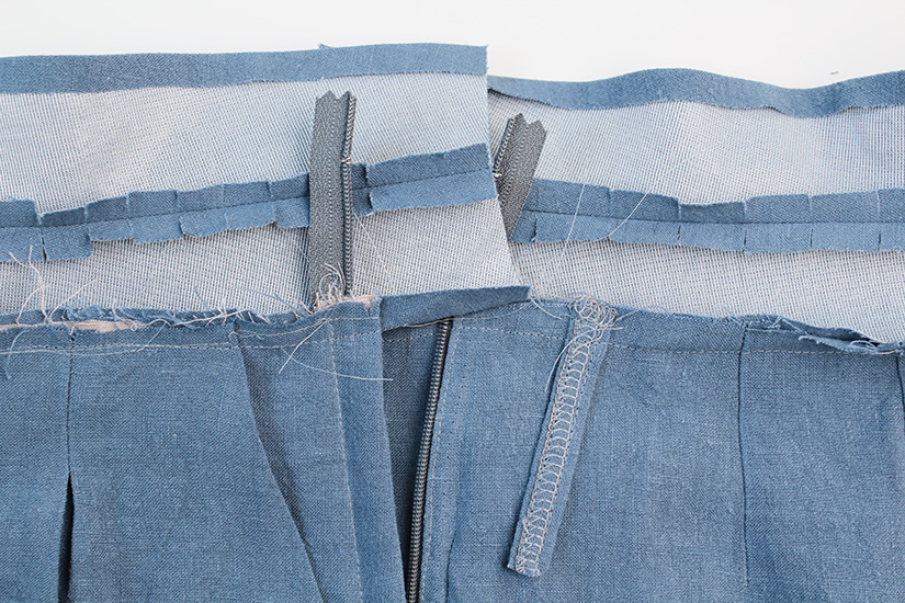 The Crew Sewing pattern waistband is shown sewn and pressed toward waistband.