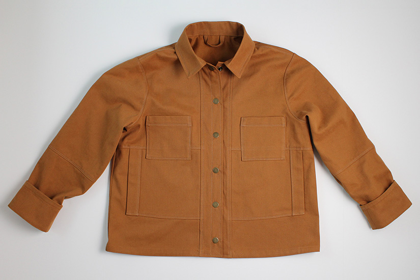 A finished Den Jacket is shown on a white background. 